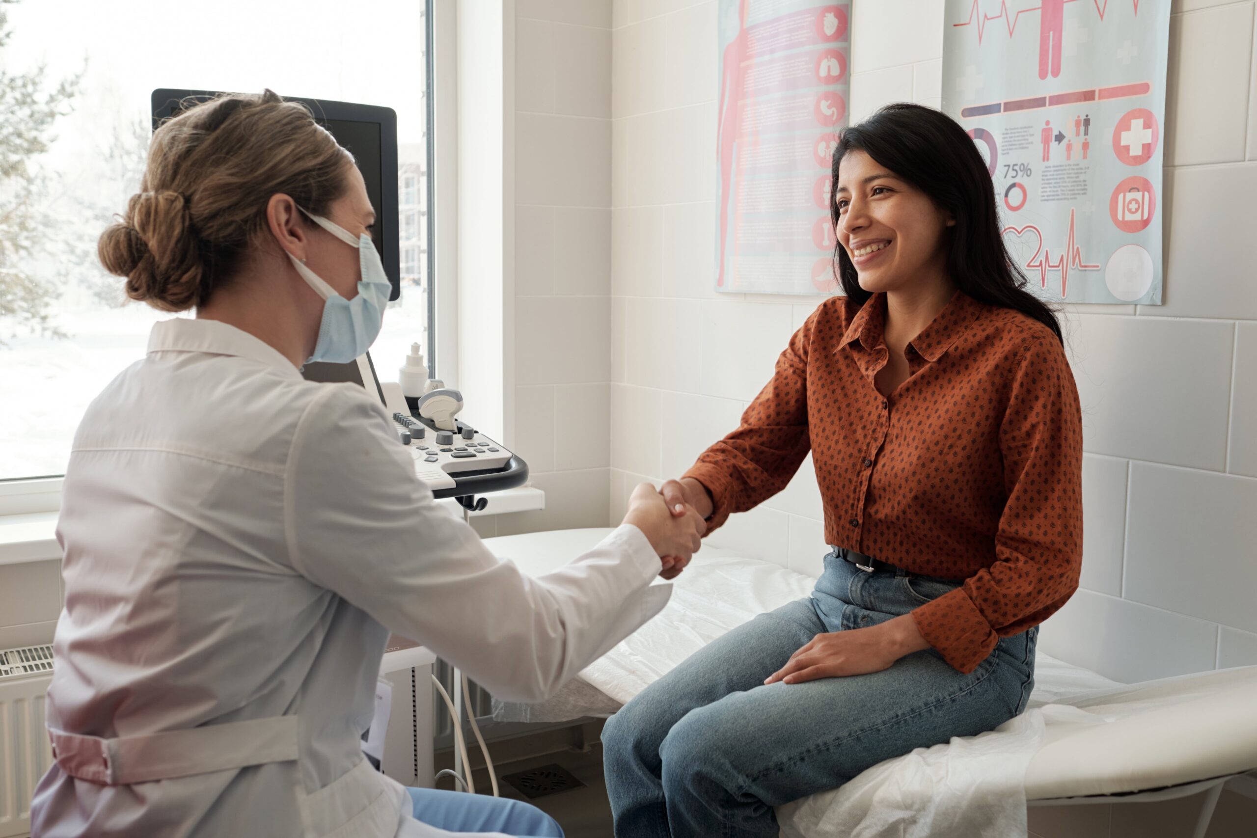 female-clinician-shaking-hand-of-young-happy-hispa-2022-03-09-22-19-58-utc-min female-clinician-shaking-hand-of-young-happy-hispa-2022-03-09-22-19-58-utc-min